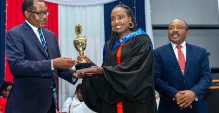 a ihti graduand being awarded a trophy jpg