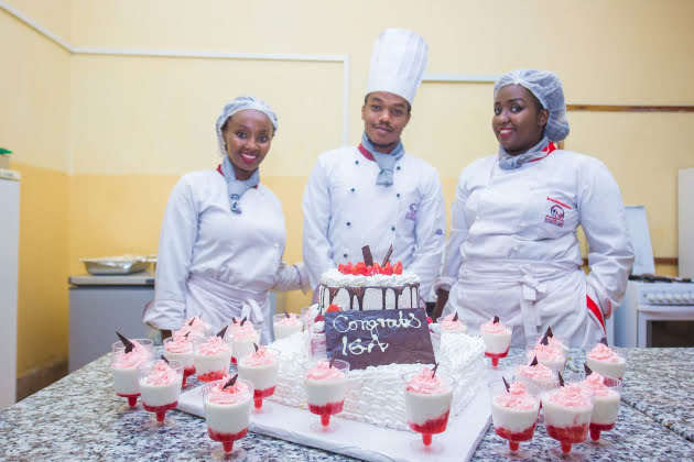ihti students proudly showcasing their cakes jpg